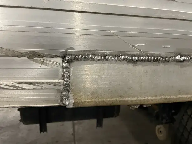 Aluminum weld bead on a fabricated bracket